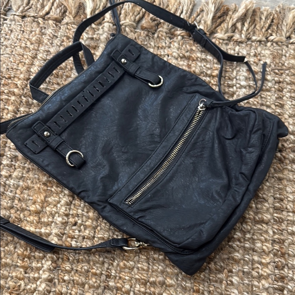 Versatile Black Backpack With Silver Accents - image 1